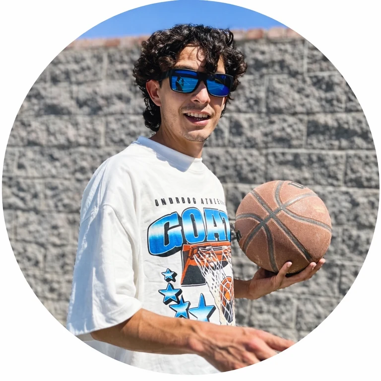 Cristobal Rodriguez holding a basketball outdoors